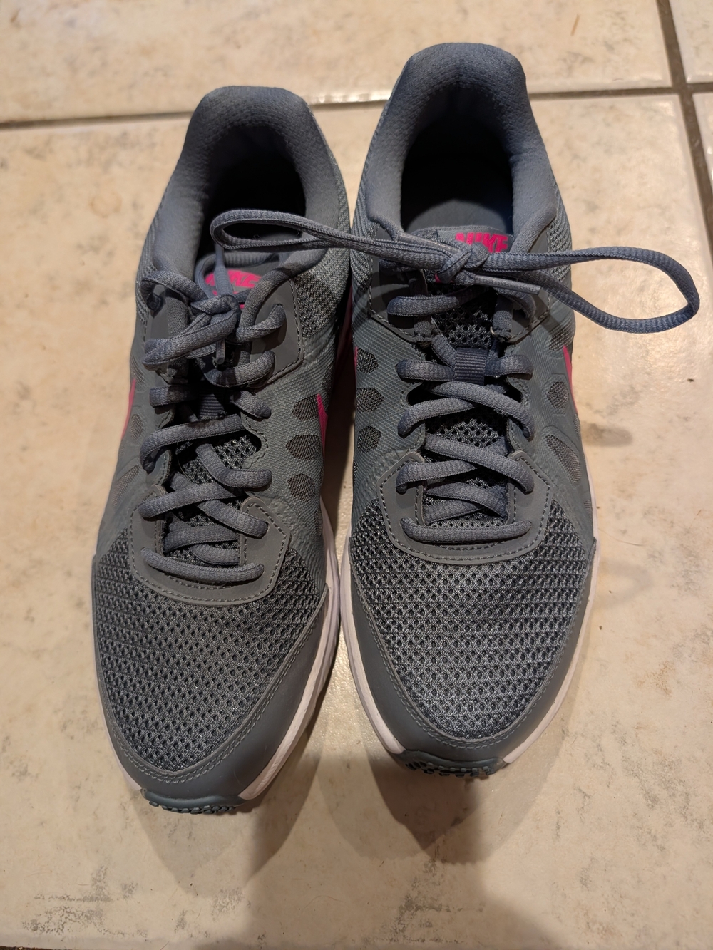 Nike Women’s Gray Running Shoes with Pink Accents, 8.5